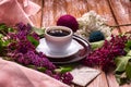 Coffee Cup And Colorful Lilac Flowers Royalty Free Stock Photo