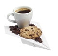 Coffee cup and cookie on a paper plane Royalty Free Stock Photo