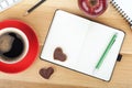 Coffee cup, cookies, red apple and office supplies Royalty Free Stock Photo