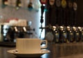 Coffee cup on a counter in a bar Royalty Free Stock Photo