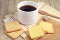 Coffee cup and cracker with cheese Royalty Free Stock Photo