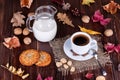 Coffee cup, cream, coffee grains and oatmeal cookies Royalty Free Stock Photo