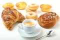 Coffee cup croissant cake and donuts Royalty Free Stock Photo