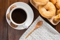 Coffee cup, donuts, cookie on wooden background, top view Royalty Free Stock Photo