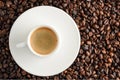 coffee cup espresso on coffee beans backgroun. top view Royalty Free Stock Photo