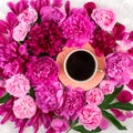 Coffee cup and floral composition with wildflowers. Flat lay, top view, creative nature concept. Feminine morning