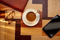 Coffee cup with glasses and tablet pc Royalty Free Stock Photo