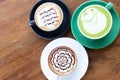 Coffee cup with Green Matcha latte art foam on wood table in coffee shop with copy space.Coffee is one of the most popular Royalty Free Stock Photo