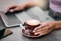 Coffee cup, hands on laptop for remote work, career research ideas and inspiration with customer experience, Internet Royalty Free Stock Photo