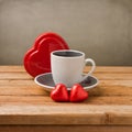 Coffee cup with heart shape chocolate