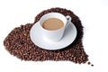 Coffee cup with heart shaped coffee beans Royalty Free Stock Photo