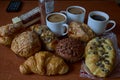 Coffee cup or hot chocolate with chocolate cookie, nuts on wooden table.Top side view, Coffe break