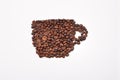 Coffee cup image made up of coffee beans on white background Royalty Free Stock Photo