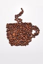 Coffee cup image made up of coffee beans on a white background Royalty Free Stock Photo