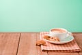 Coffee cup with Italian biscotti cookies on wooden table background