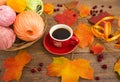 The coffee Cup, knitting, autumn leaves Royalty Free Stock Photo