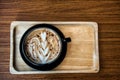 Coffee cup with latte art foam Royalty Free Stock Photo