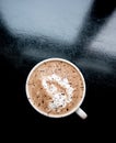 Coffee cup latte mocha looking down from above with design in the cream whipped top