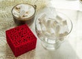 Coffee Cup with marshmallows ring in a box on the table with lace tablecloth, surprise concept for woman Royalty Free Stock Photo