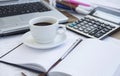Coffee Cup at Office with Financial Papers, Agenda and Calculator Royalty Free Stock Photo