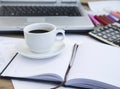 Coffee Cup at Office over Financial Papers and Agenda.Coffee Bre Royalty Free Stock Photo