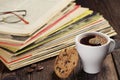 Coffee cup and old magazines Royalty Free Stock Photo