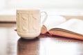 Coffee cup and open book Royalty Free Stock Photo