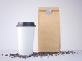 Coffee cup and paper bag on wooden table . 3d rendering Royalty Free Stock Photo