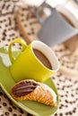 Coffee cup with pastry