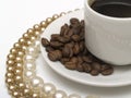 Coffee cup and pearl beads