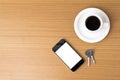 Coffee cup and phone and key Royalty Free Stock Photo