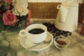 Coffee cup and pot on marble table Royalty Free Stock Photo