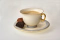 Coffee cup and pralines Royalty Free Stock Photo