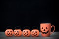 Coffee cup and pumpkin. Halloween concept Royalty Free Stock Photo