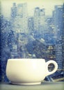 Coffee cup on a rainy day in front of the window Royalty Free Stock Photo