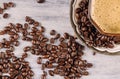 Coffee cup with roasted coffee beans around Royalty Free Stock Photo