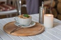 Coffee cup and romantic candles closeup Royalty Free Stock Photo