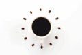 Coffee cup on saucer and coffee beans against white background f Royalty Free Stock Photo