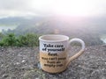 Coffee cup with self love care message on it - Take care of yourself first. You can`t pour from an empty cup. Royalty Free Stock Photo