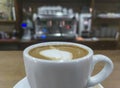 Coffee cup served over bar counter Royalty Free Stock Photo