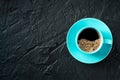 Coffee cup, shot from the top on a black stone background with copy space Royalty Free Stock Photo