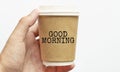 Coffee cup with sign GOOD MORNING, business concept