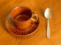 Coffee Cup and Spoon On Wooden Table Royalty Free Stock Photo