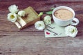 Coffee cup with spring flower lisianthus and notes good morning Royalty Free Stock Photo