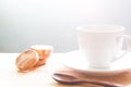 Coffee cup with stack cookies on wooden board