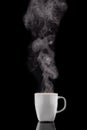 Coffee cup and steam. Freshly brewed coffee in a white ceramic mug