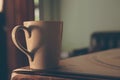 Coffee cup with steam set in low light background,Coffee in love concept.