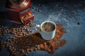 Coffee cup with steaming hot drink on ground coffee and roasted beans in front of a vintage grinder, dark background with copy Royalty Free Stock Photo