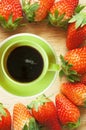 Coffee cup in strawberries frame Royalty Free Stock Photo