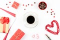 Coffee cup, sweets, lipstick, heart shape and giftbox on white background. Women`s Day concept flat lay. Royalty Free Stock Photo